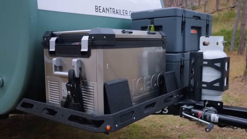 Electric car cooler mounted on an off road trailer during outdoor travel
