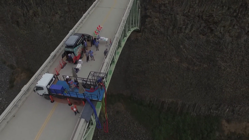 People prepare for a bungee jump from the bridge at Crooked River Gorge in Oregon
